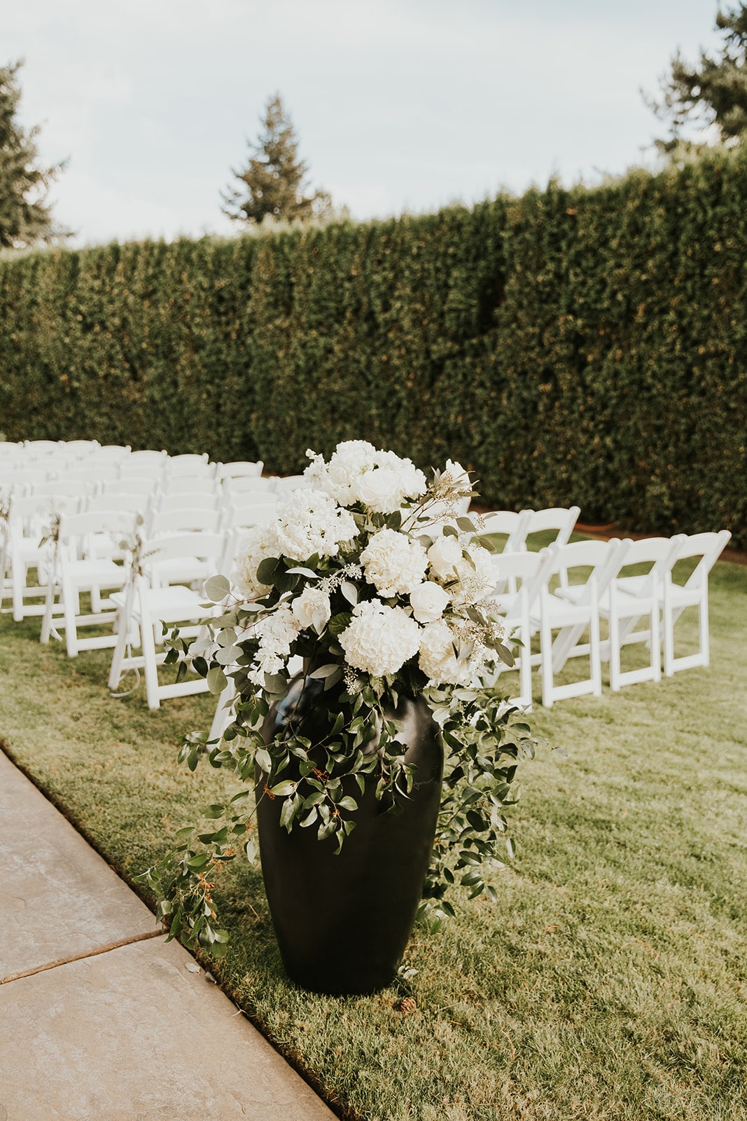 hydrangea, roses, stock flowers, southern smilax, smilax, urn arrangements, ceremony decor, classic wedding flowers,portland wedding florist, portland wedding flowers, oregon wedding florist, oregon wedding flowers, classic romantic wedding, bride and groom, engaged, wedding day, wedding flowers, wedding florist  