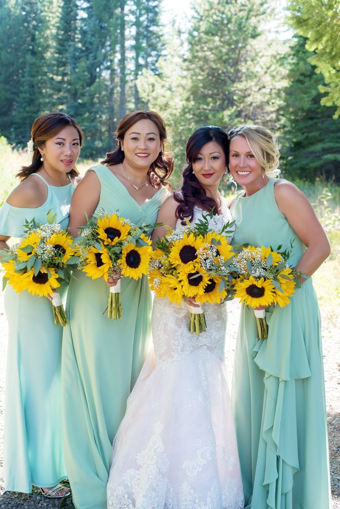 bridal party flowers, bridal party, bridesmaids, bridesmaids dresses, sea foam green bridesmaid dresses, mint bridesmaid dresses, sunflower bouquets, sunflower bridesmaid bouquets