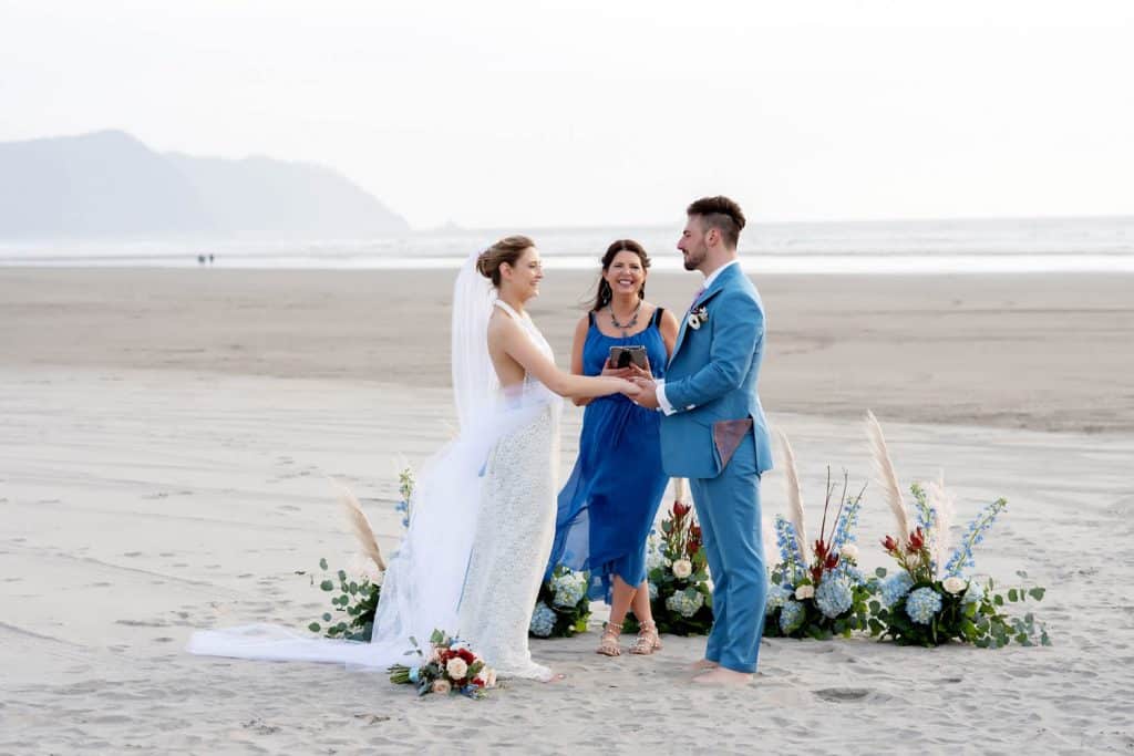 beach wedding, oregon beach wedding, oregon coast ceremony, oregon coast ceremonies, beach elopement, oregon coast elopement, bride and groom, wedding details, on the ground floral installation, on the ground wedding altar, wedding flowers, oregon wedding florist, oregon wedding flowers, portland wedding florist, portland wedding flowers