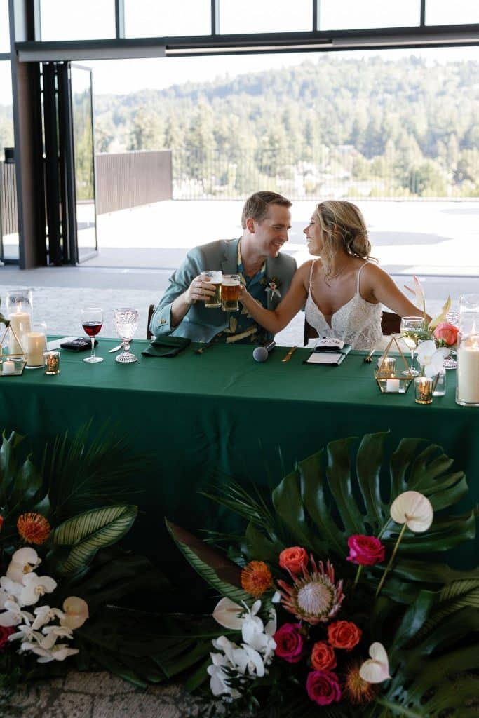 bride and groom at their modern tropical wedding reception at ironlight in lake oswego
