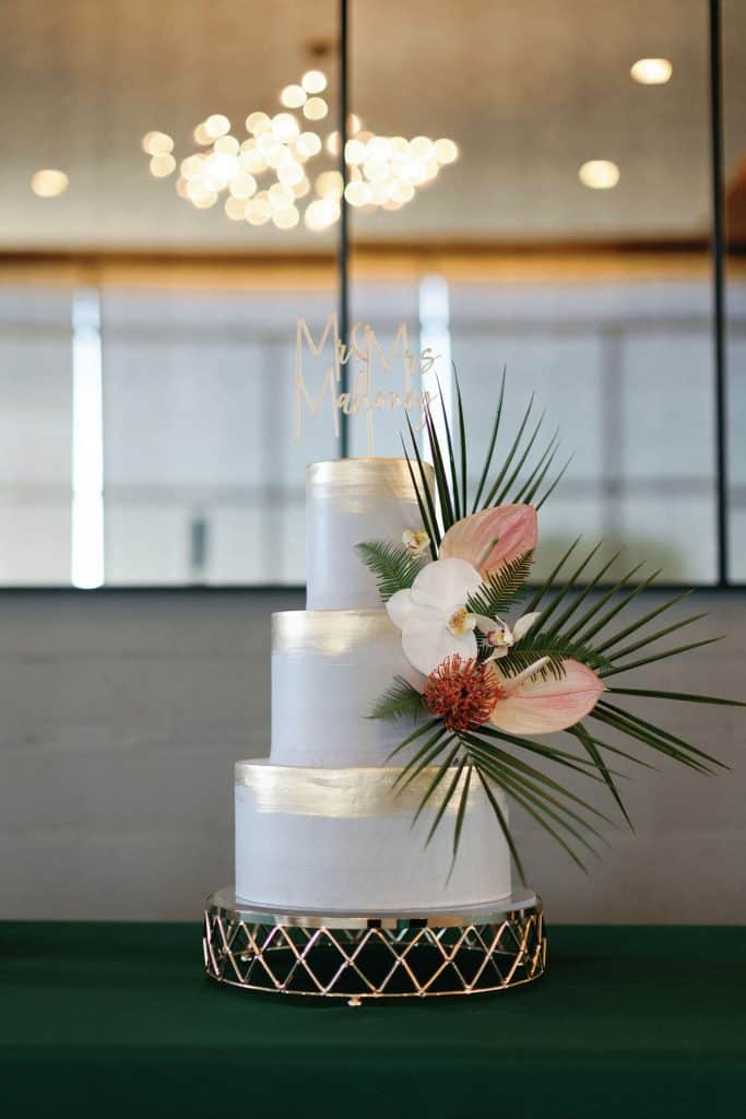 modern tropical wedding flowers on a cake by Dream Cakes, flowers designed by Flowers by Alana
